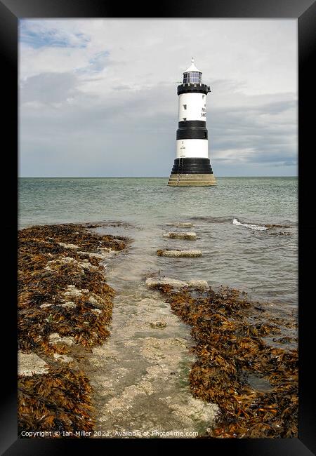 Lighthouse Penmon Point Framed Print by Ian Miller