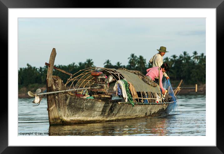 Fishing boat on the Mekong River Framed Mounted Print by Ian Miller
