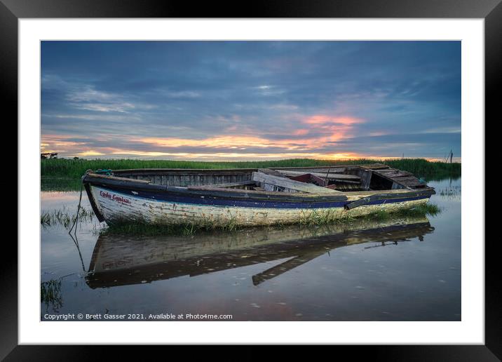 Old boat at Brancaster Staithe Framed Mounted Print by Brett Gasser