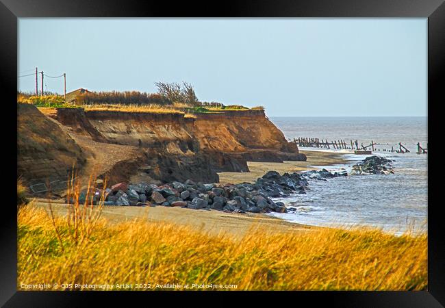 Crumbling Cliffs into the Sea Framed Print by GJS Photography Artist