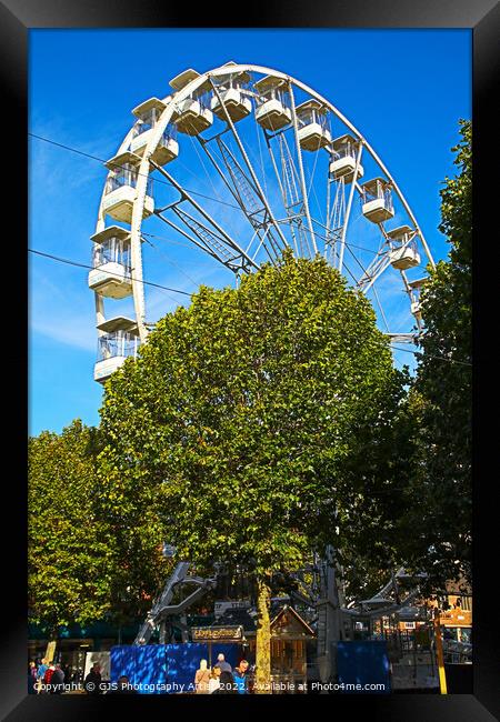 Ferris Wheel Behind the Trees Framed Print by GJS Photography Artist