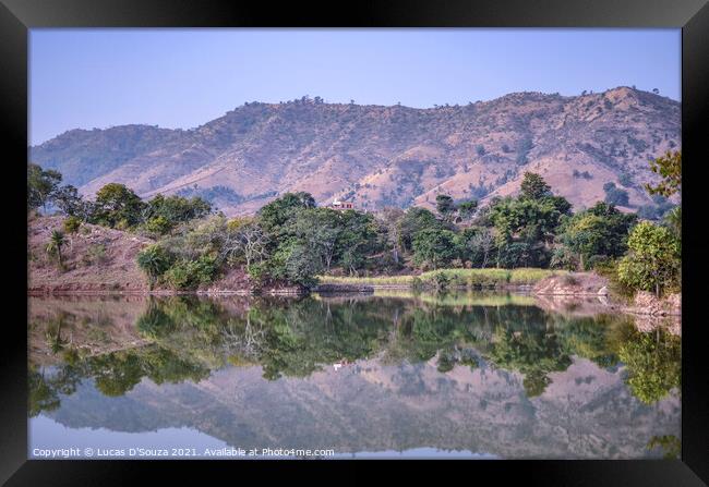 Reflection of trees and hills in the water Framed Print by Lucas D'Souza