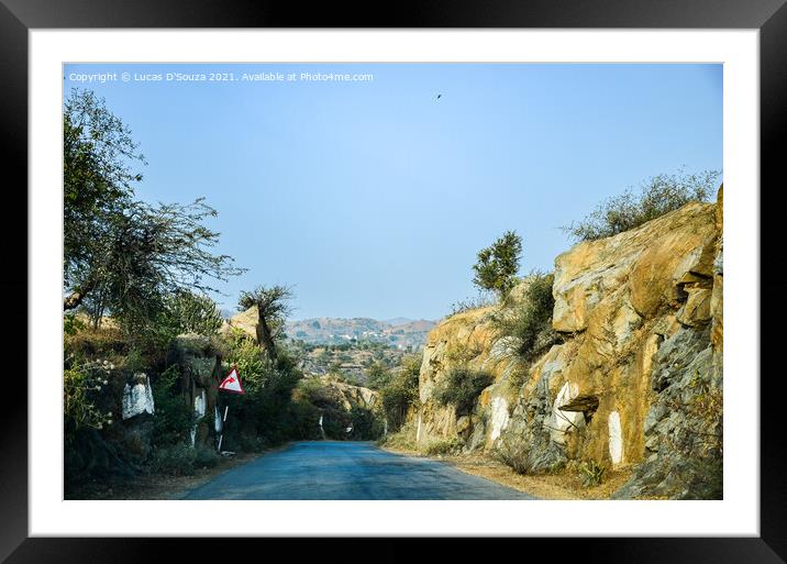Village road through a rocky terrain Framed Mounted Print by Lucas D'Souza