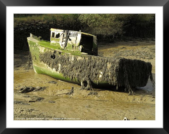 Decaying Remnants of a Fishing Boat Framed Mounted Print by Roger Mechan
