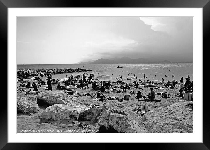 Storm Brewing Over Cannes Beach Framed Mounted Print by Roger Mechan