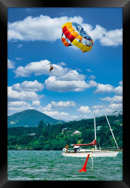 Glide over Austria's Scenic Lake Framed Print by Roger Mechan