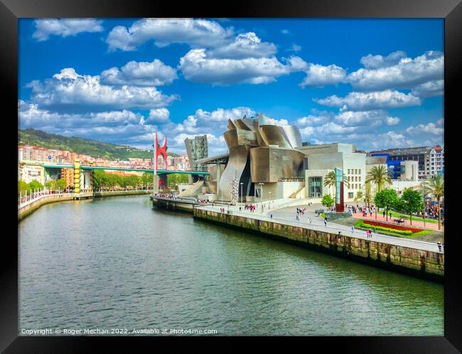Iconic Bilbao Guggenheim in summer splendour Framed Print by Roger Mechan