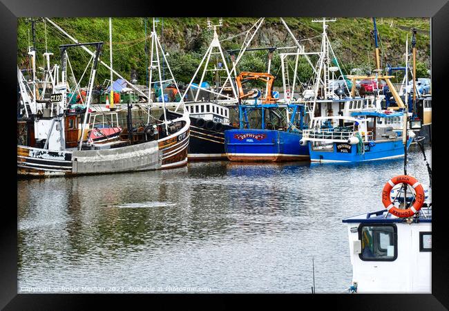 Fishing Boats at Rest Framed Print by Roger Mechan