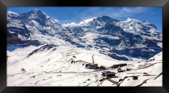 Snowy Peaks of the Swiss Alps Framed Print by Roger Mechan