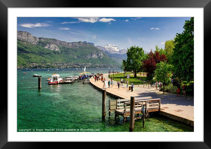 A busy day on Lake Annecy Framed Mounted Print by Roger Mechan