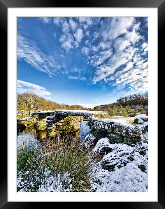 Dartmoor clapper bridge in the snow Framed Mounted Print by Roger Mechan