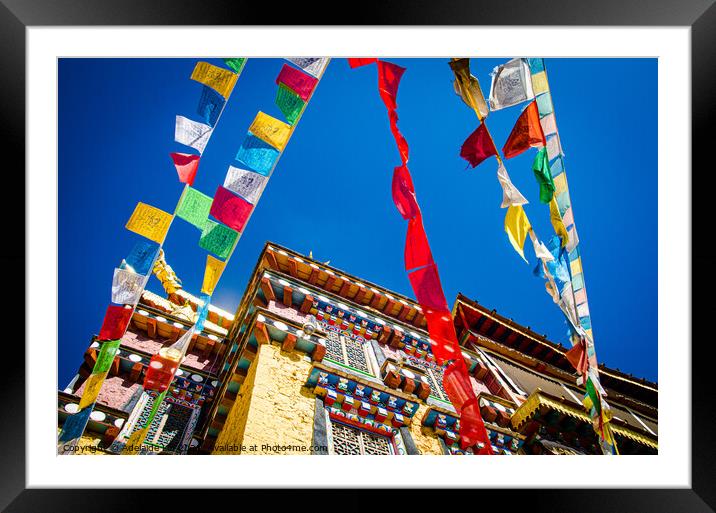 Colorful Tibetan prayer flags spreading good fortune hanging on  Framed Mounted Print by Adelaide Lin