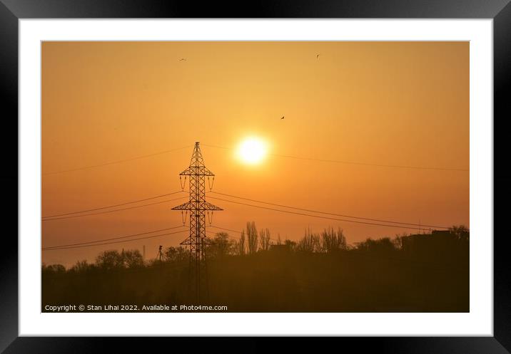 Sunrise over electricity tower Framed Mounted Print by Stan Lihai