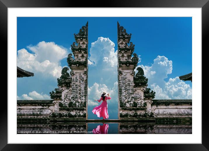 Young woman standing in temple gates at Lempuyang Luhur temple  Framed Mounted Print by Stan Lihai