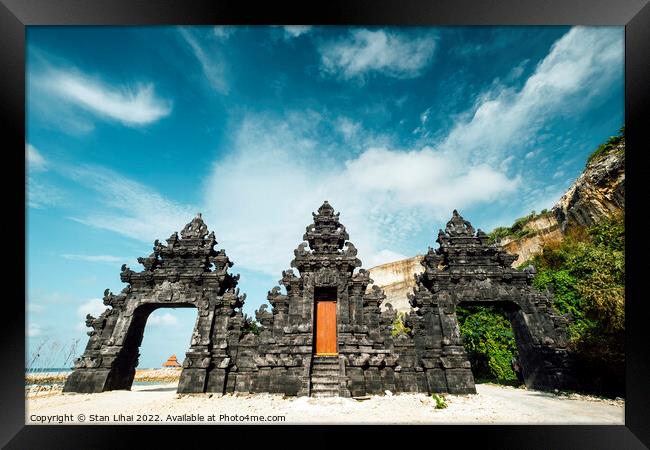 Bali Temple gate entrance at beach Framed Print by Stan Lihai