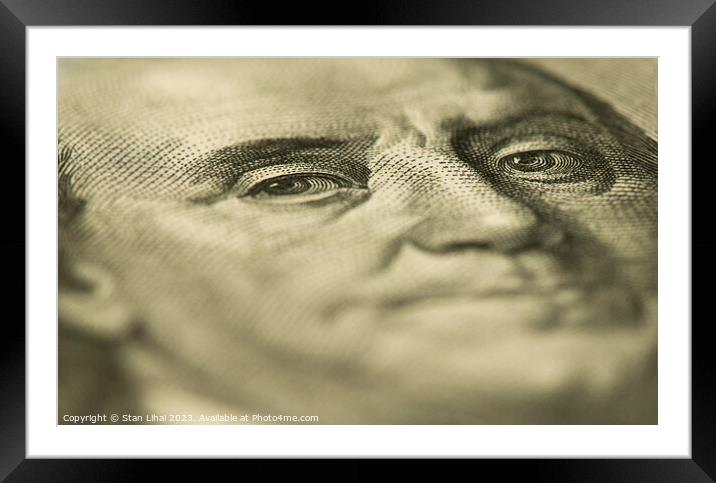 Benjamin Franklin's eyes on the 100 dollar bill Framed Mounted Print by Stan Lihai