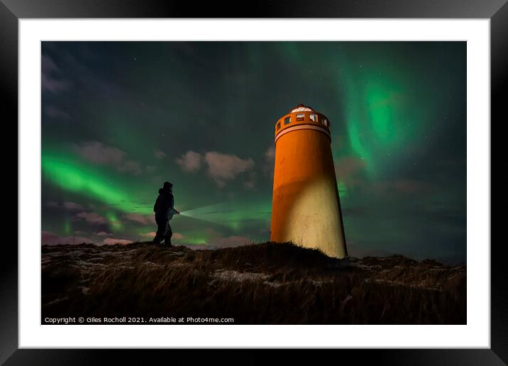 Exploring night time Iceland light house Framed Mounted Print by Giles Rocholl