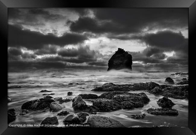 Sea stack and storm Iceland Framed Print by Giles Rocholl
