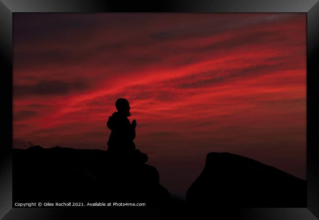 Praying monk at sunrise Framed Print by Giles Rocholl
