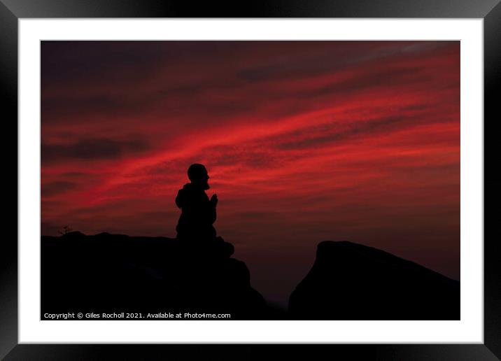 Praying monk at sunrise Framed Mounted Print by Giles Rocholl