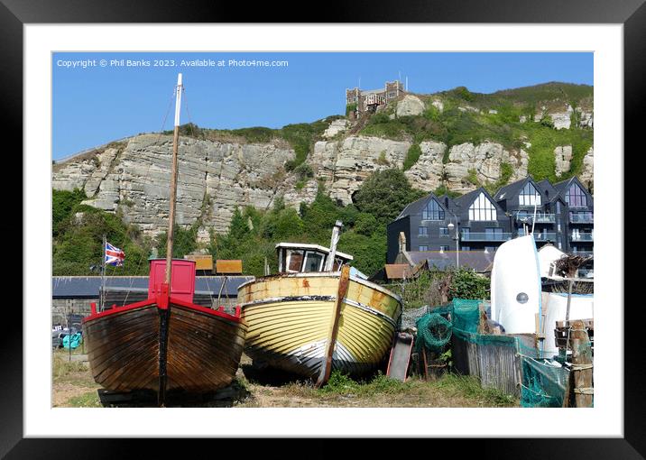 Boats, Old Town Net Shops and Cliffs at Hastings, East Sussex Framed Mounted Print by Phil Banks