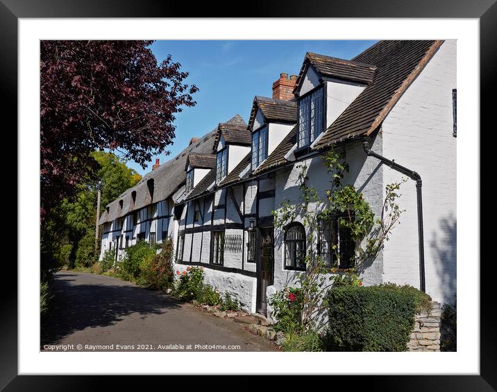 Black and White cottages UK Framed Mounted Print by Raymond Evans