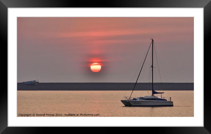 Sunset over Barrow-in-Furness and the Piel Channel  Framed Mounted Print by Russell Finney