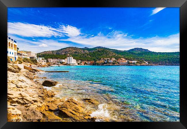 Serene Beauty of Sant Elm Bay Framed Print by Alex Winter