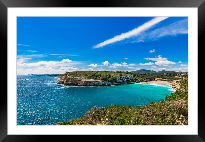 Idyllic panoramic view the coastline bay and beach of Cala Romantica Framed Mounted Print by Alex Winter