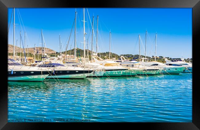 Luxury yachts boats anchored in mediterranean marina on Mallorca Framed Print by Alex Winter