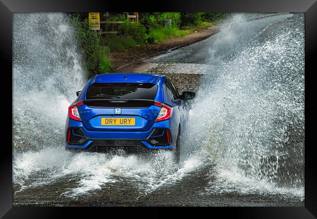 Blue Honda Civic conquers flooded Ford Framed Print by Martin Day