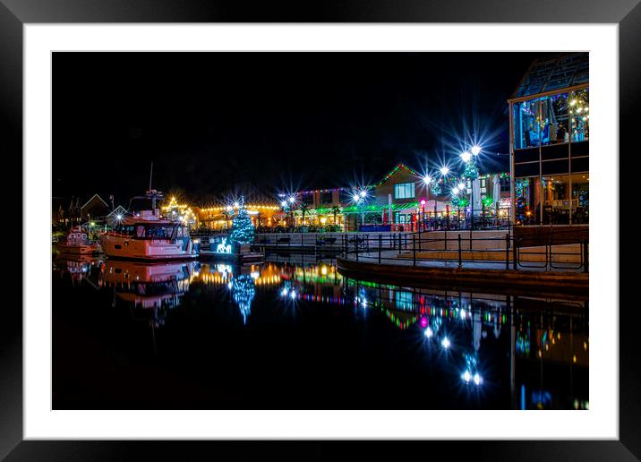Sovereign Harbour night lights Framed Mounted Print by Fiona Etkin