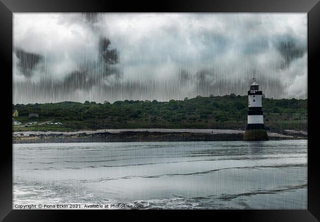 Penmon lighthouse Anglesey Framed Print by Fiona Etkin