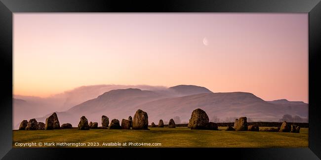 Castlerigg stone circle and moon at sunrise Framed Print by Mark Hetherington