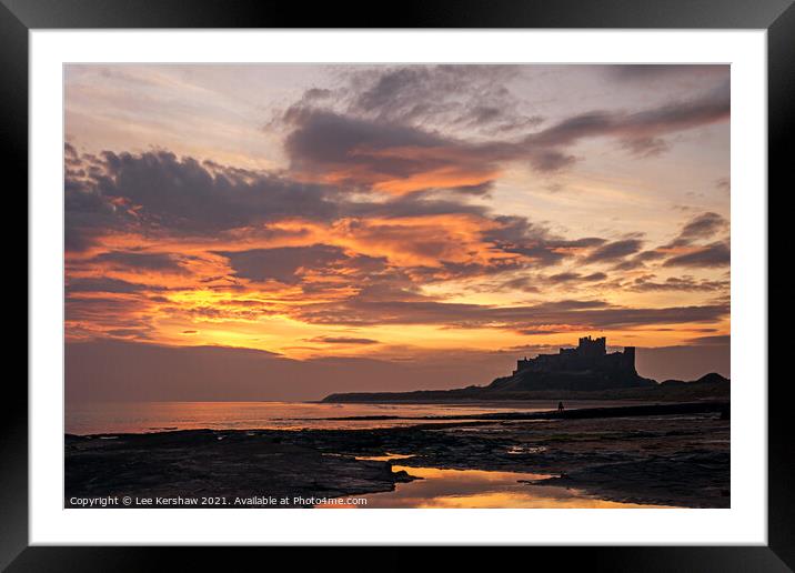 Bamburgh fiery sky Framed Mounted Print by Lee Kershaw