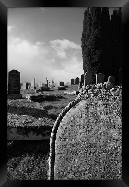 Graveyard Framed Print by john maclean