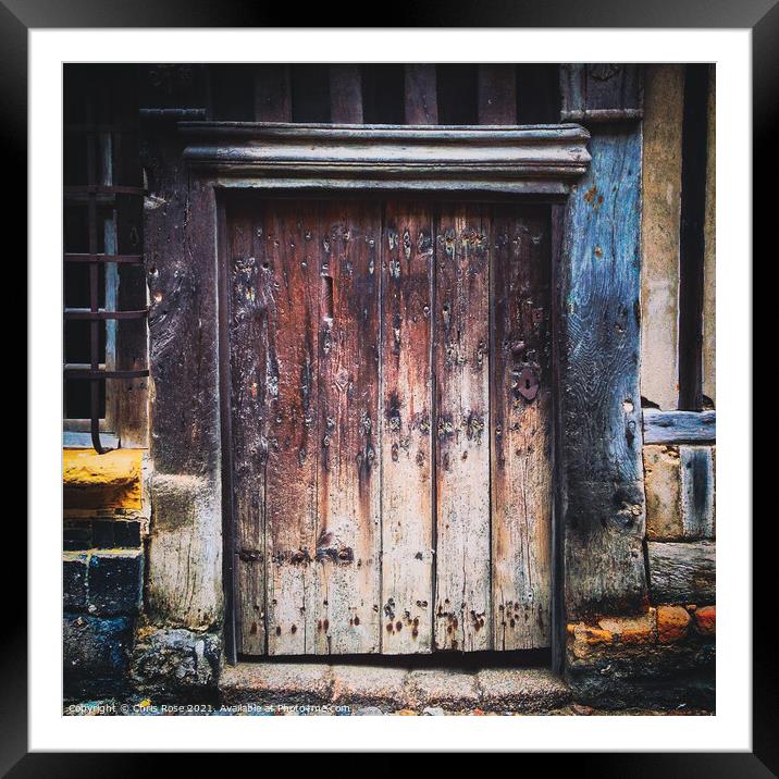 Ancient weathered wooden doorway Framed Mounted Print by Chris Rose