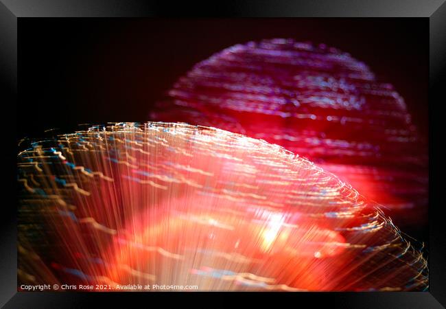 Coloured lights and motion blur abstract Framed Print by Chris Rose