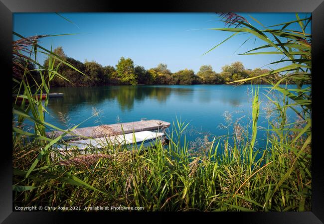 Tranquil lake Framed Print by Chris Rose