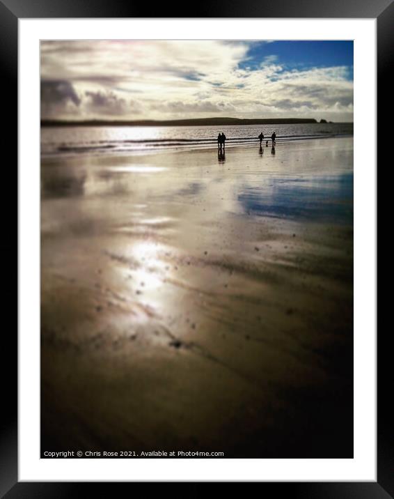 Couples walking on a beach Framed Mounted Print by Chris Rose