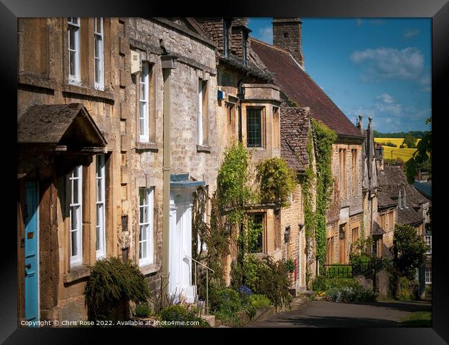 Typical Cotswolds architecure in Burford Framed Print by Chris Rose
