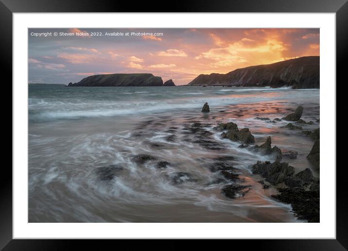 Serene and fiery sunset at Marloe Sands Framed Mounted Print by Steven Nokes