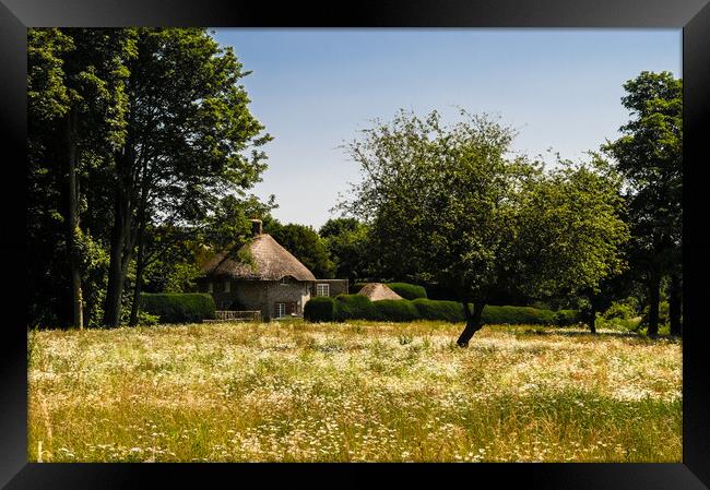 Wild meadow and thatched cottage. Framed Print by Gerry Walden LRPS