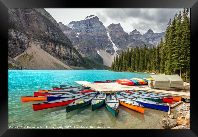 Red Canoe Moraine Lake Blue Water Framed Print by Pierre Leclerc Photography