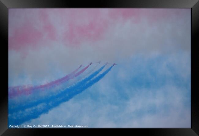 Red Arrows Heading Back Into the Smoke Framed Print by Roy Curtis