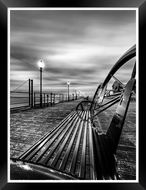 Pier bench at Southend on sea pier  Framed Print by johnny weaver