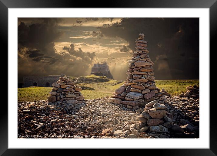 Holy Island rock piles Framed Mounted Print by Duncan Spence