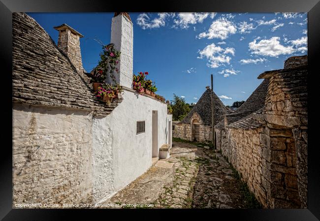 Trulli Houses Framed Print by Duncan Spence