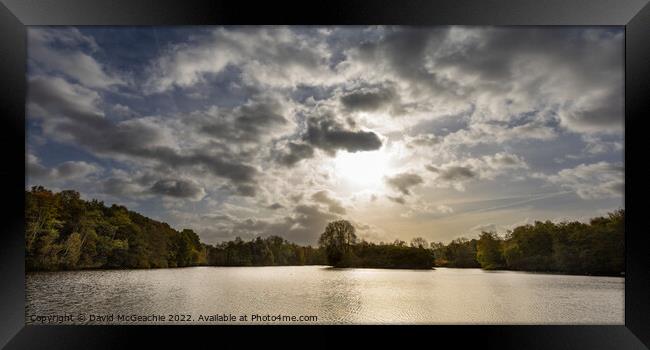 Serene Winter Sunset at Rufford Abbey Lake Framed Print by David McGeachie