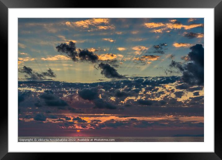 Sunset in the clouds Framed Mounted Print by Viktoriia Novokhatska
